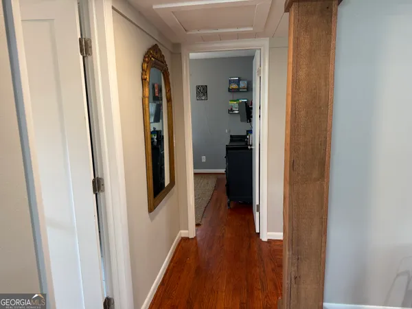 a room with furniture and a flat screen tv