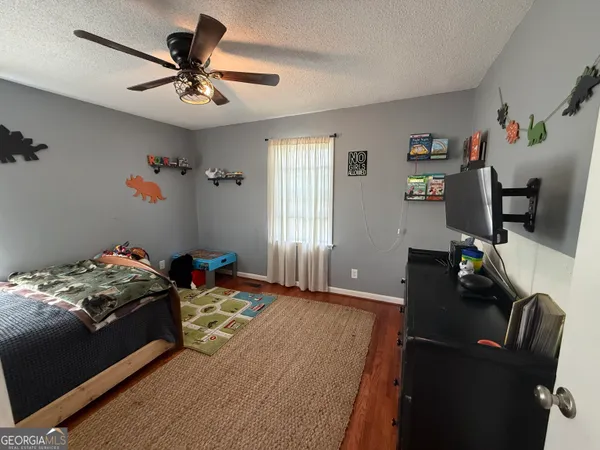 a view of a yard with trees