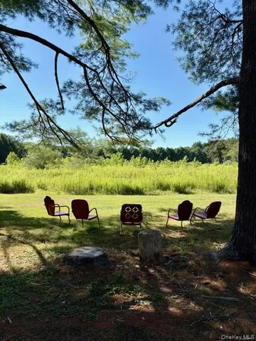 an aerial view of residential house with outdoor space