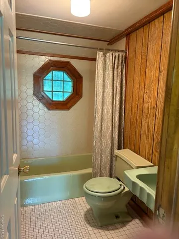 a view of a house with a garden