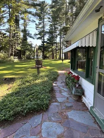 a view of backyard with green space