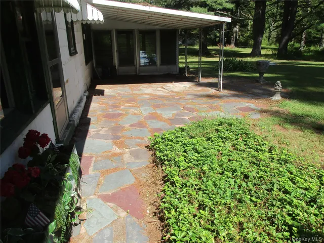 a front view of a house with yard