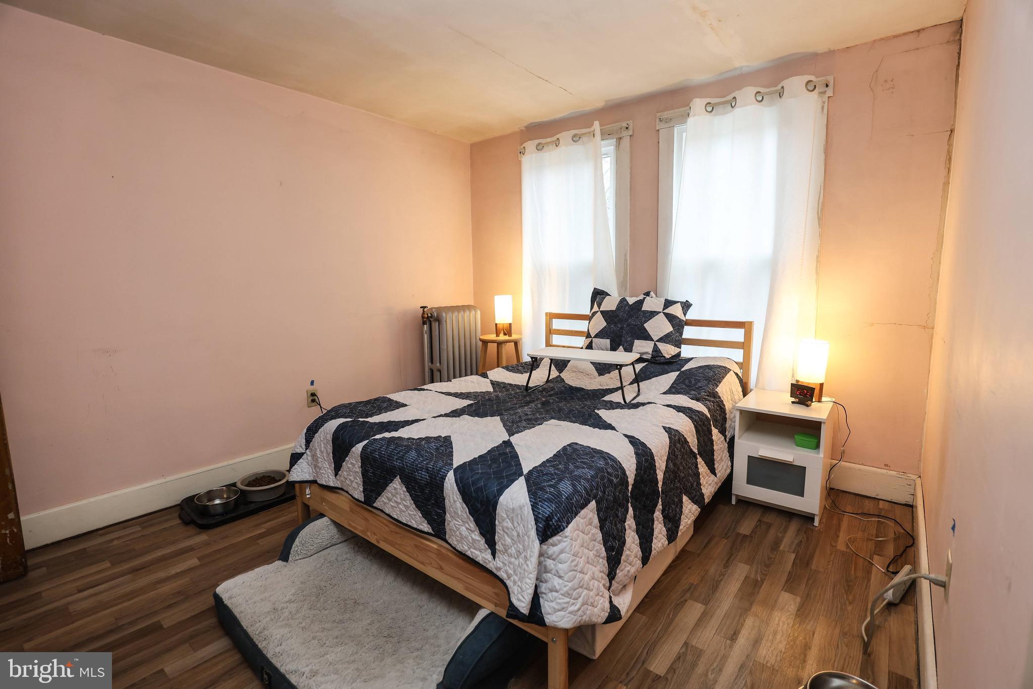 535 Main Street Lykens, PA 17048 - Photo 17 of 47 a bed sitting in a bedroom next to a window