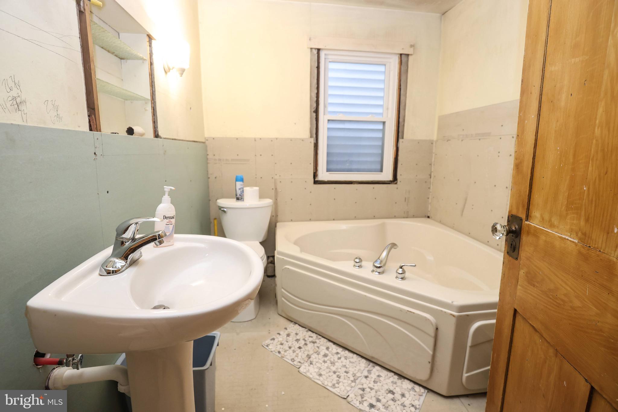 535 Main Street Lykens, PA 17048 - Photo 20 of 47 a bathroom with a sink and a bathtub