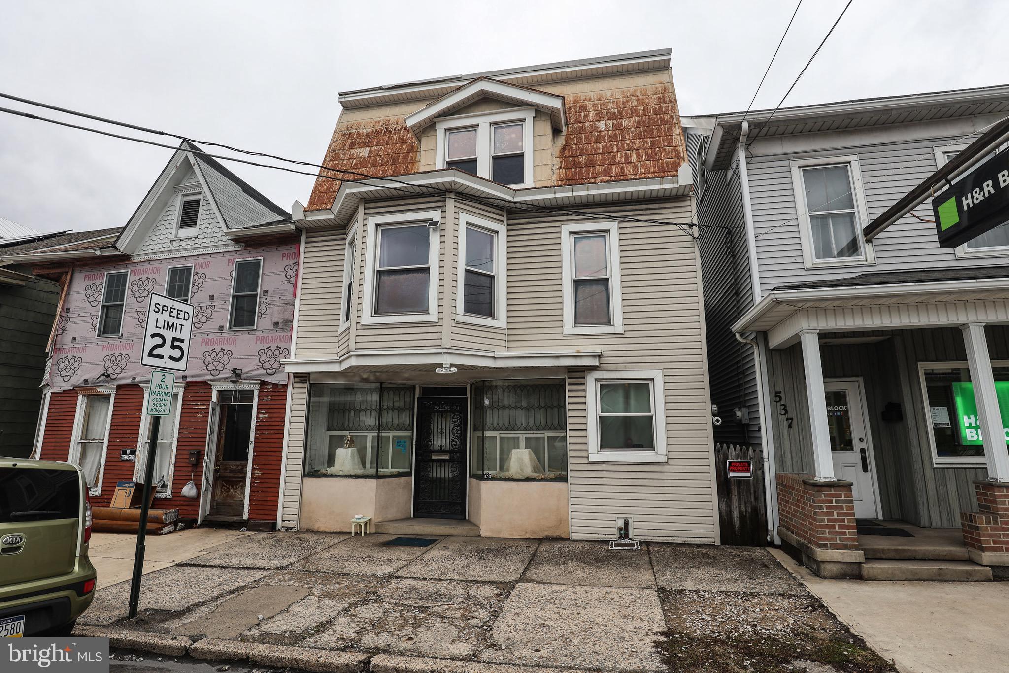 535 Main Street Lykens, PA 17048 - Photo 2 of 47 a view of a white house with many windows