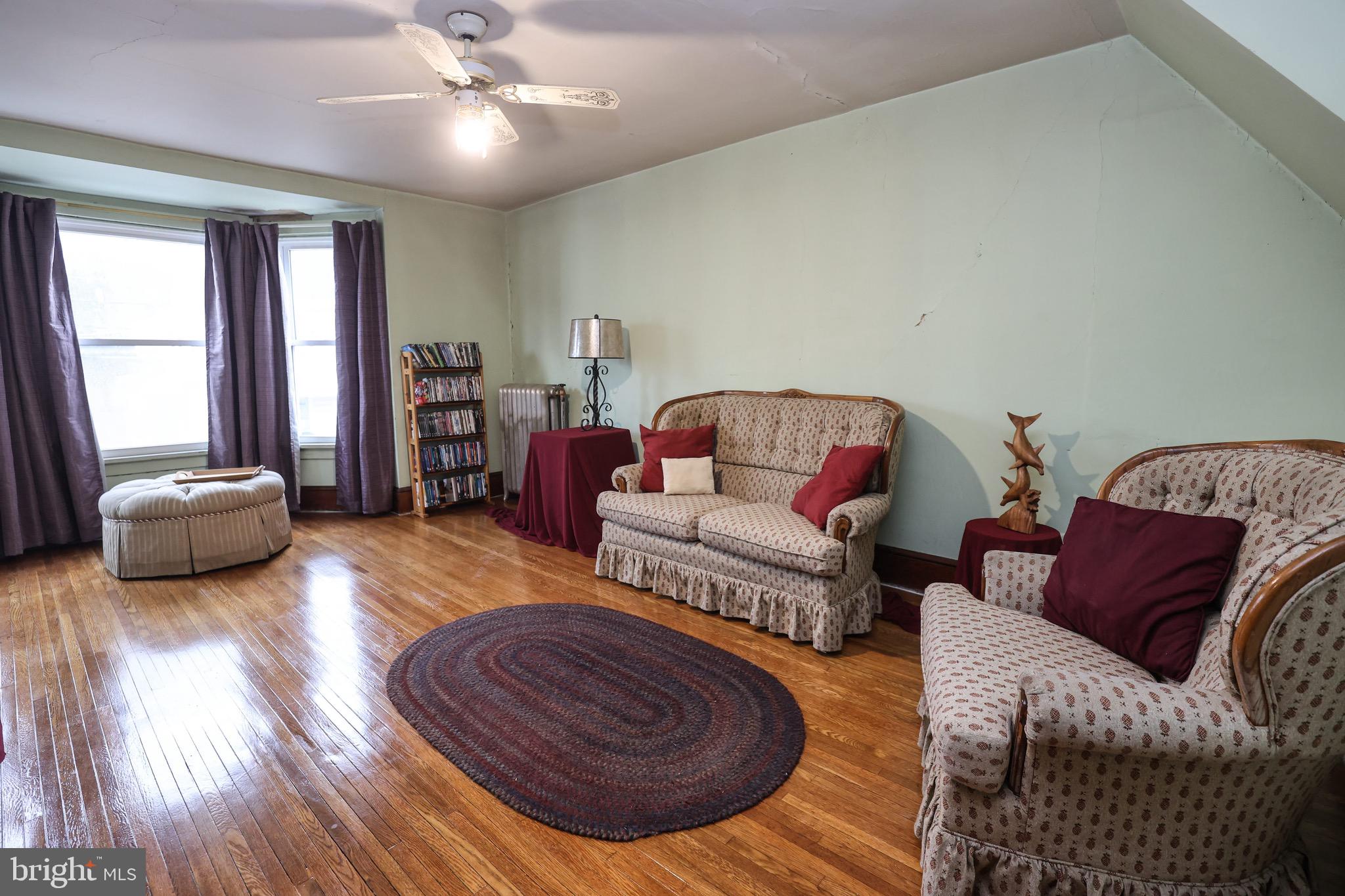 535 Main Street Lykens, PA 17048 - Photo 22 of 47 a living room with furniture and a wooden floor