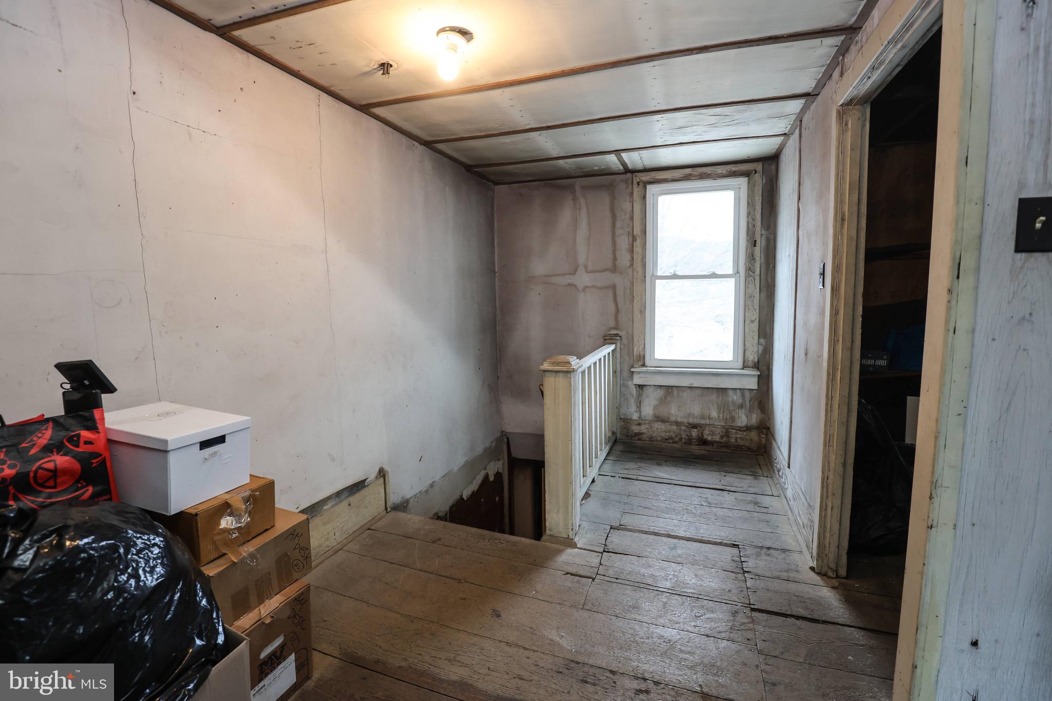 535 Main Street Lykens, PA 17048 - Photo 28 of 47 a view of a room that has a bed and a window in it