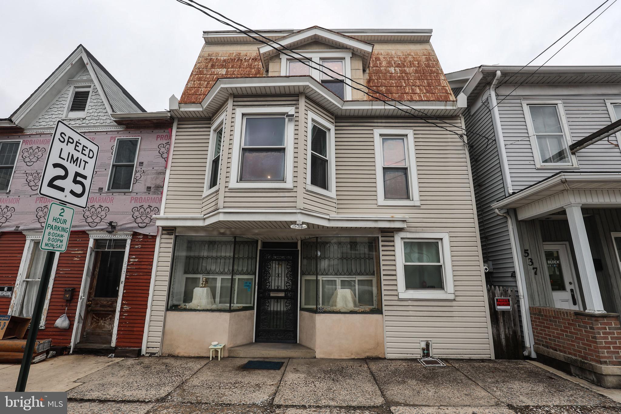 535 Main Street Lykens, PA 17048 - Photo 3 of 47 a front view of a house with a yard