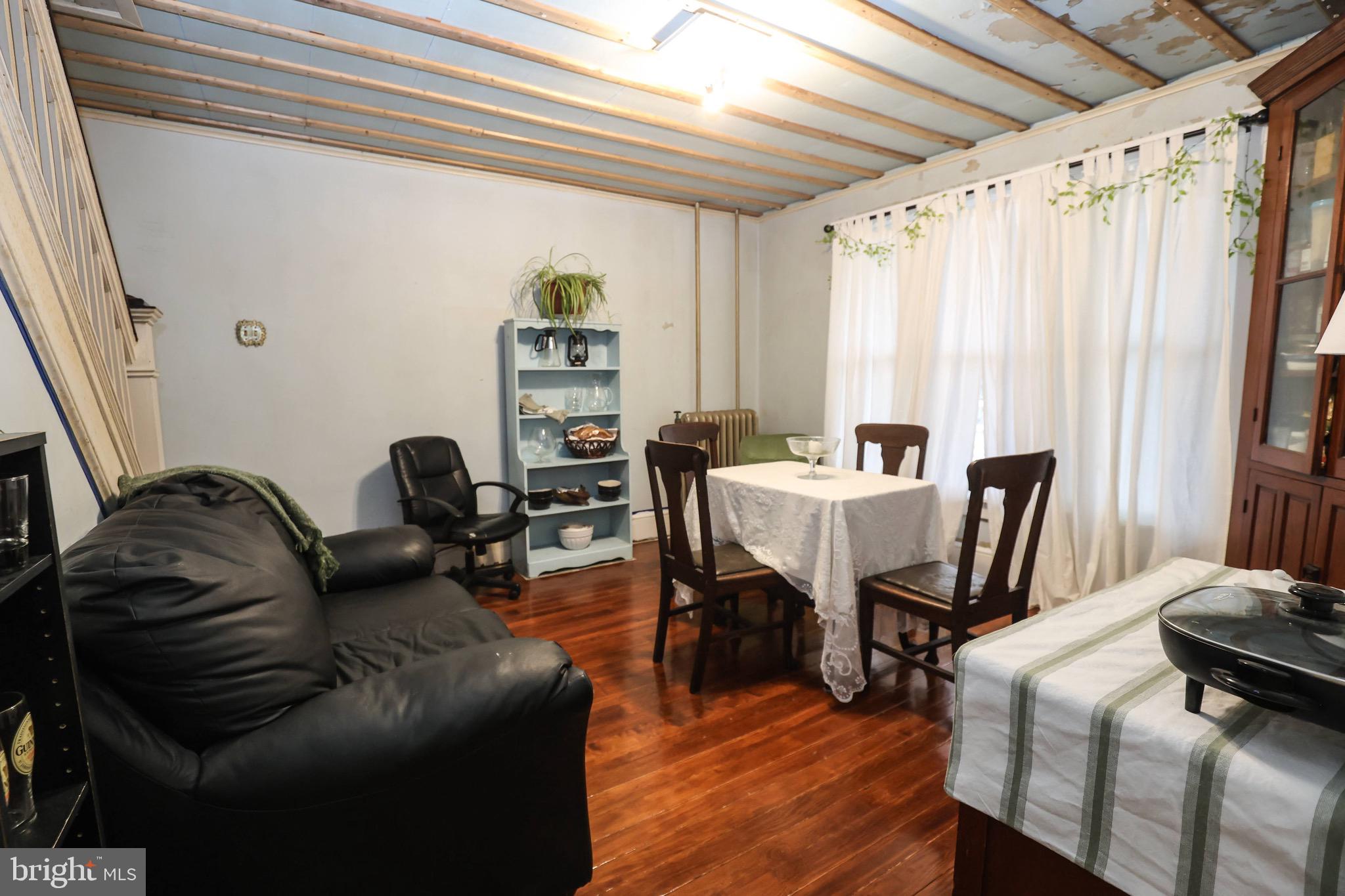 535 Main Street Lykens, PA 17048 - Photo 7 of 47 a living room with furniture a rug and a table
