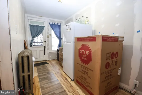 a view of hallway with washer and dryer
