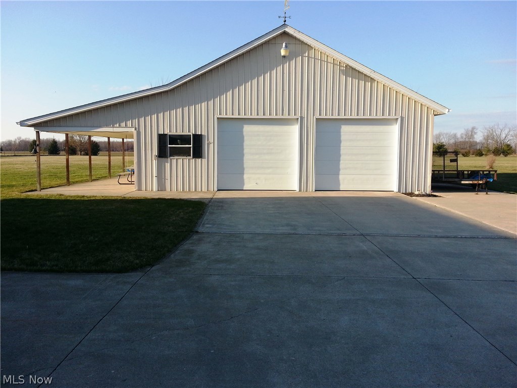 42156 Biggs Road Lagrange, OH 44050 - Photo 33 of 35 Large detached outbuilding capable of holding 8 vehicles