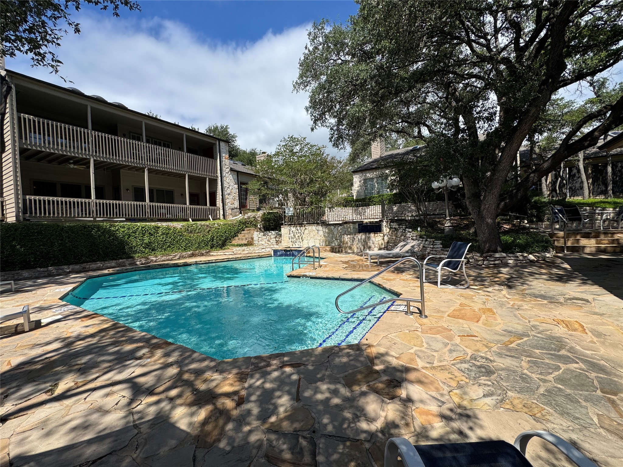 3809 Spicewood Springs Road, Unit 137 Austin, TX 78759 - Photo 29 of 34 Ready for an afternoon dip after work? Just pop out your back door and you are here!