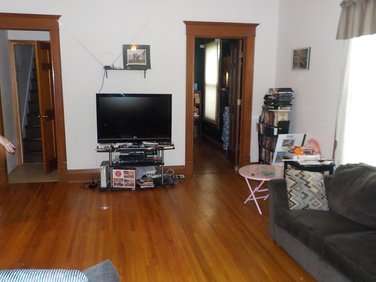 105 Main Street Kings, IL 61068 - Photo 5 of 19 a living room with furniture and a flat screen tv