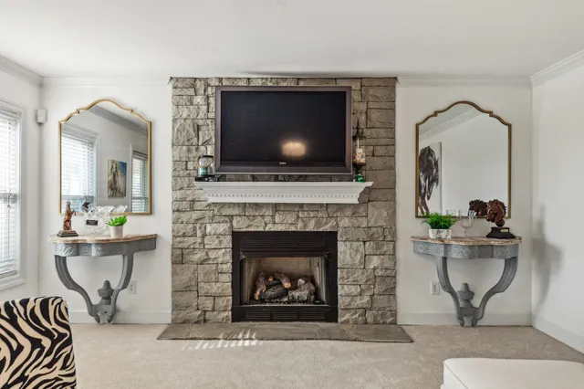 a kitchen with cabinets and window