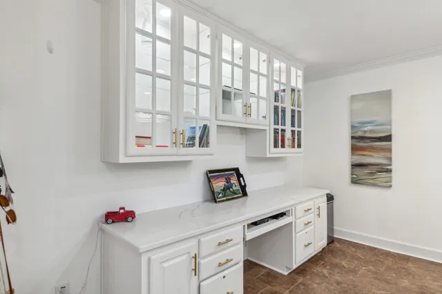 a bathroom with a double vanity sink mirror and shower
