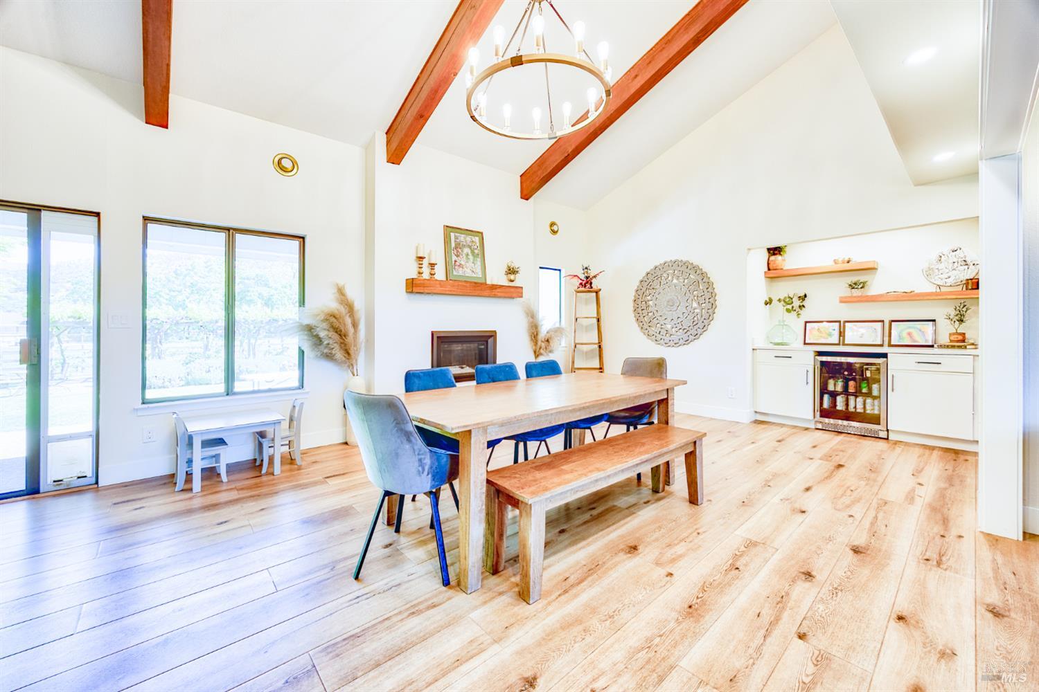 6282 Melita Road Santa Rosa, CA 95409 - Photo 12 of 55 a living room with furniture a table and wooden floor