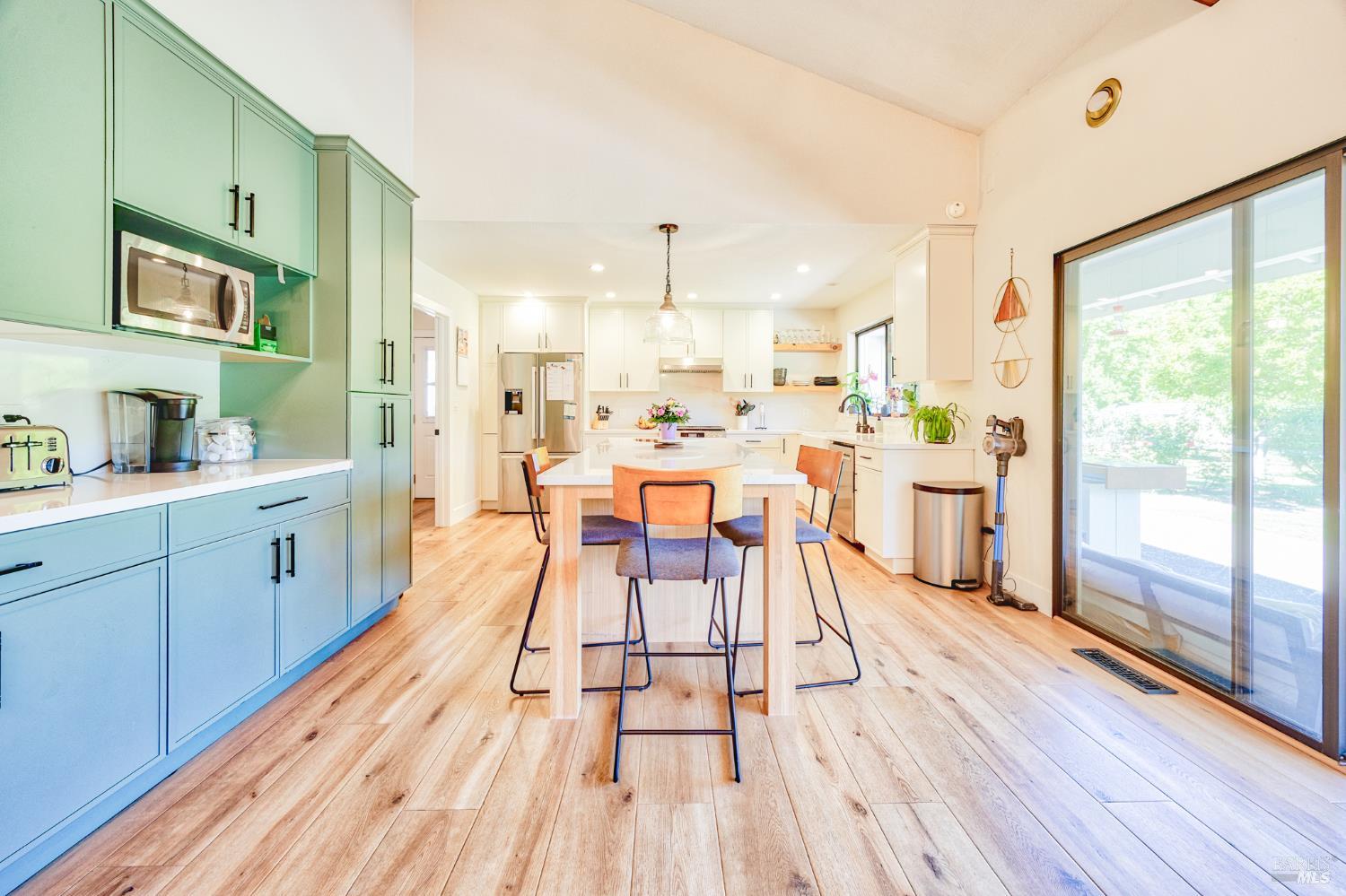 6282 Melita Road Santa Rosa, CA 95409 - Photo 16 of 55 The beautifully updated kitchen space and extra storage space with microwave and coffee bar space. Photo has been digitally edited