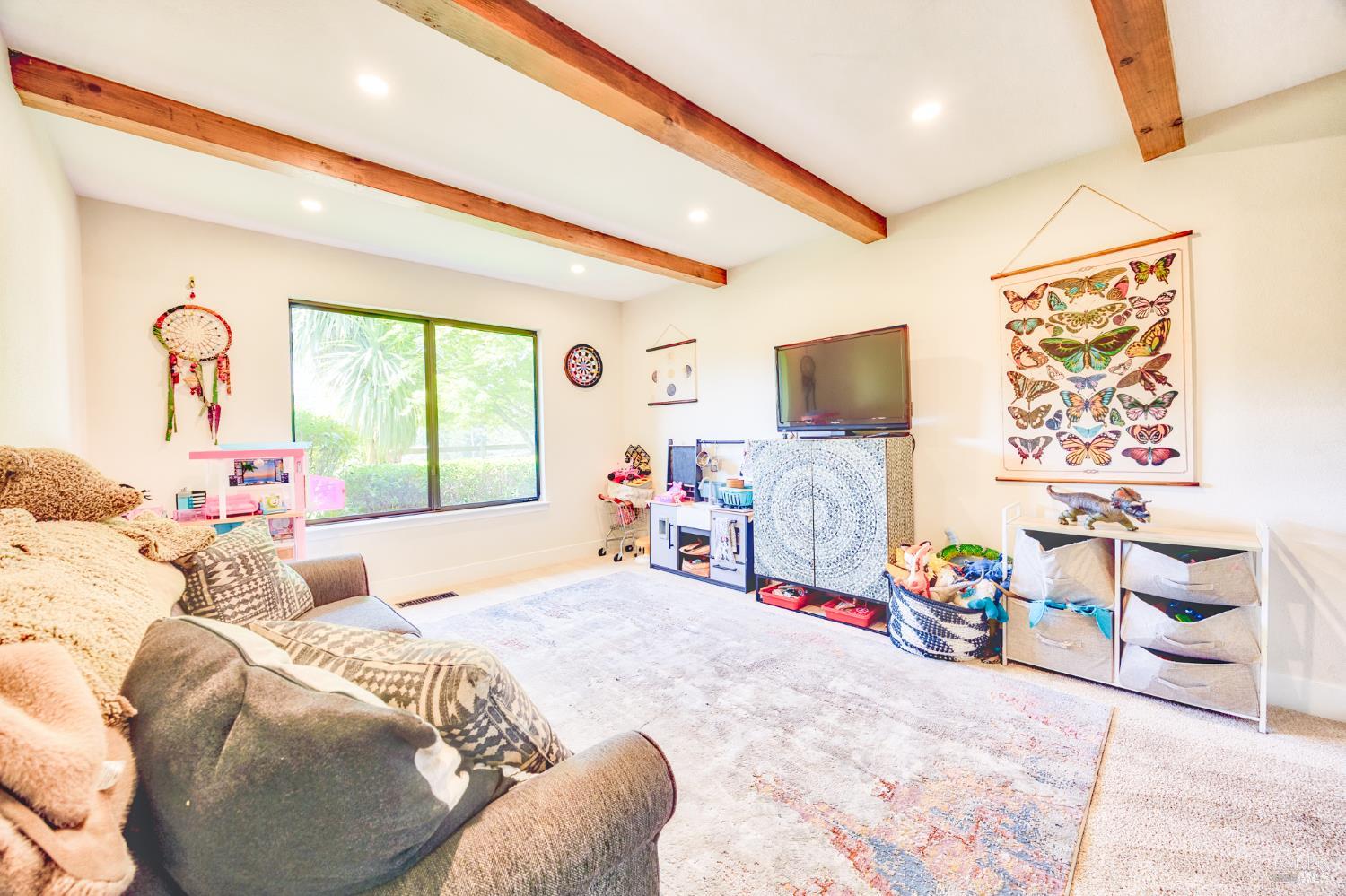 6282 Melita Road Santa Rosa, CA 95409 - Photo 18 of 55 a bedroom with a bed and a flat screen tv