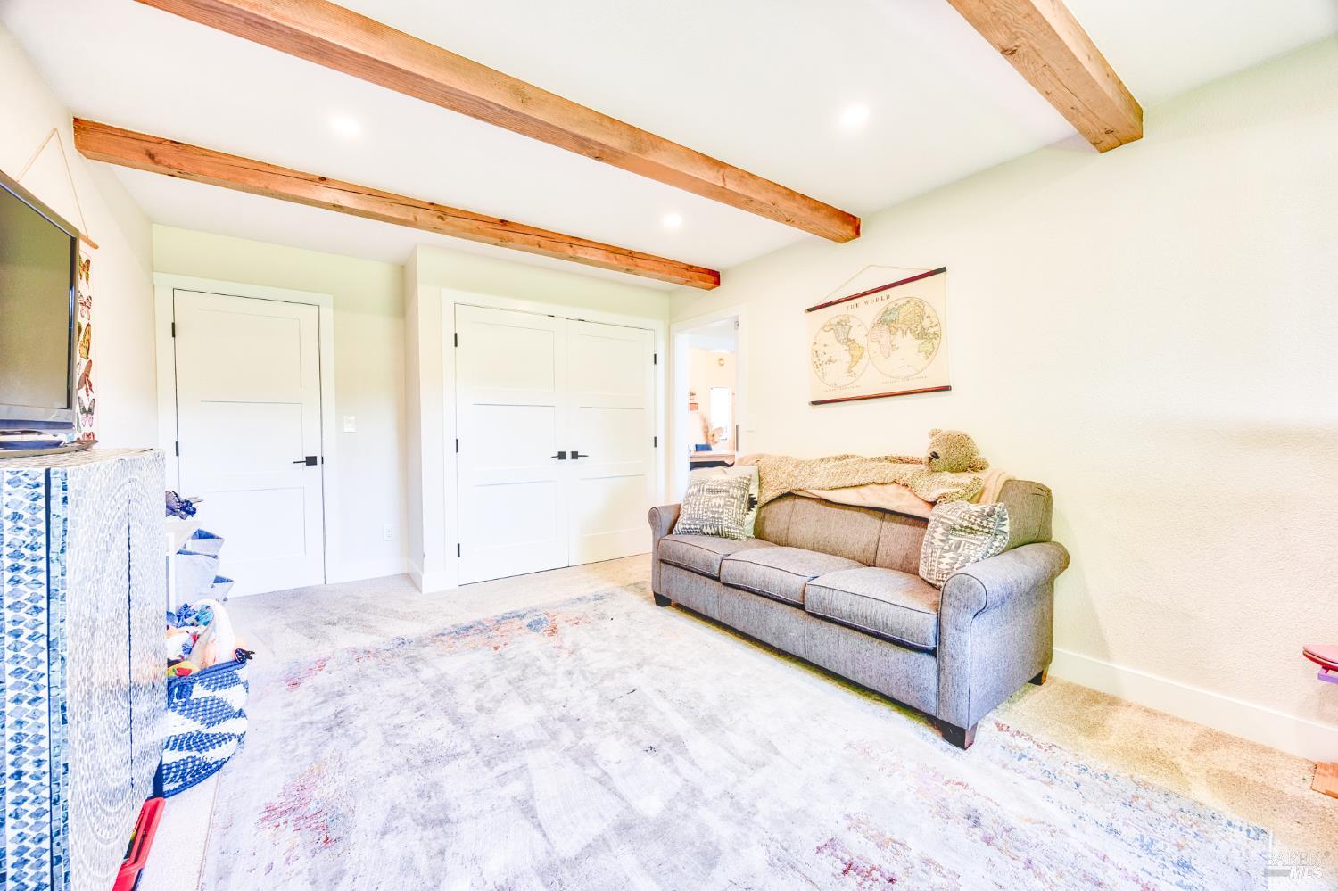 6282 Melita Road Santa Rosa, CA 95409 - Photo 19 of 55 a living room with furniture and a flat screen tv