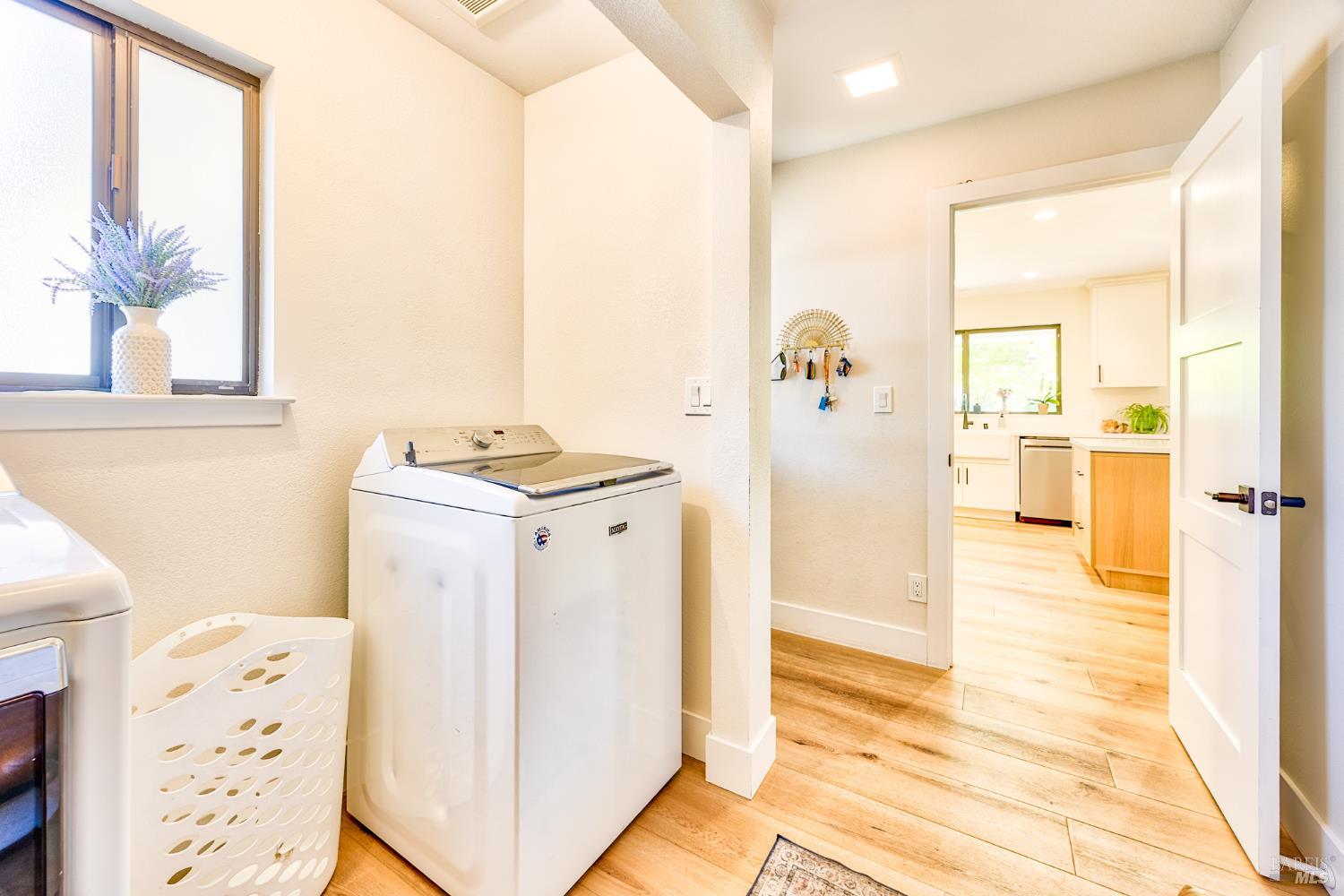 6282 Melita Road Santa Rosa, CA 95409 - Photo 24 of 55 Laundry room in hallway with plenty of space! Photo has been digitally edited