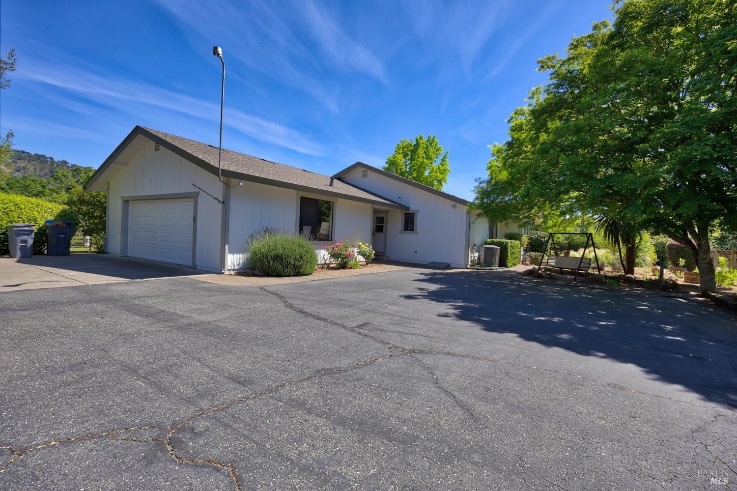6282 Melita Road Santa Rosa, CA 95409 - Photo 42 of 55 a view of a house with a yard and tree