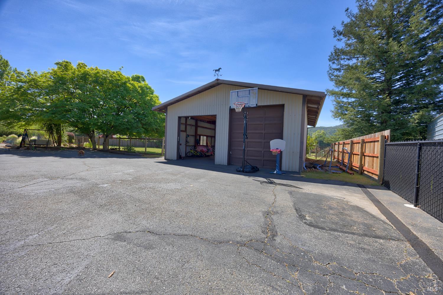 6282 Melita Road Santa Rosa, CA 95409 - Photo 45 of 55 a view of an house with backyard and trees
