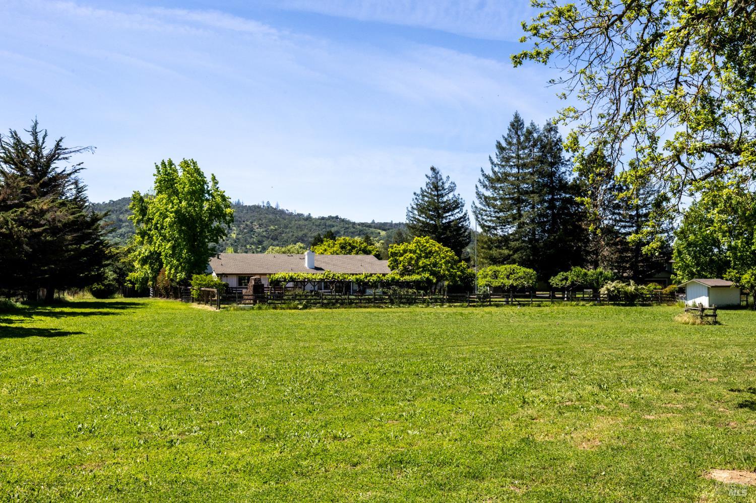 6282 Melita Road Santa Rosa, CA 95409 - Photo 49 of 55 a view of a garden with a house in the background