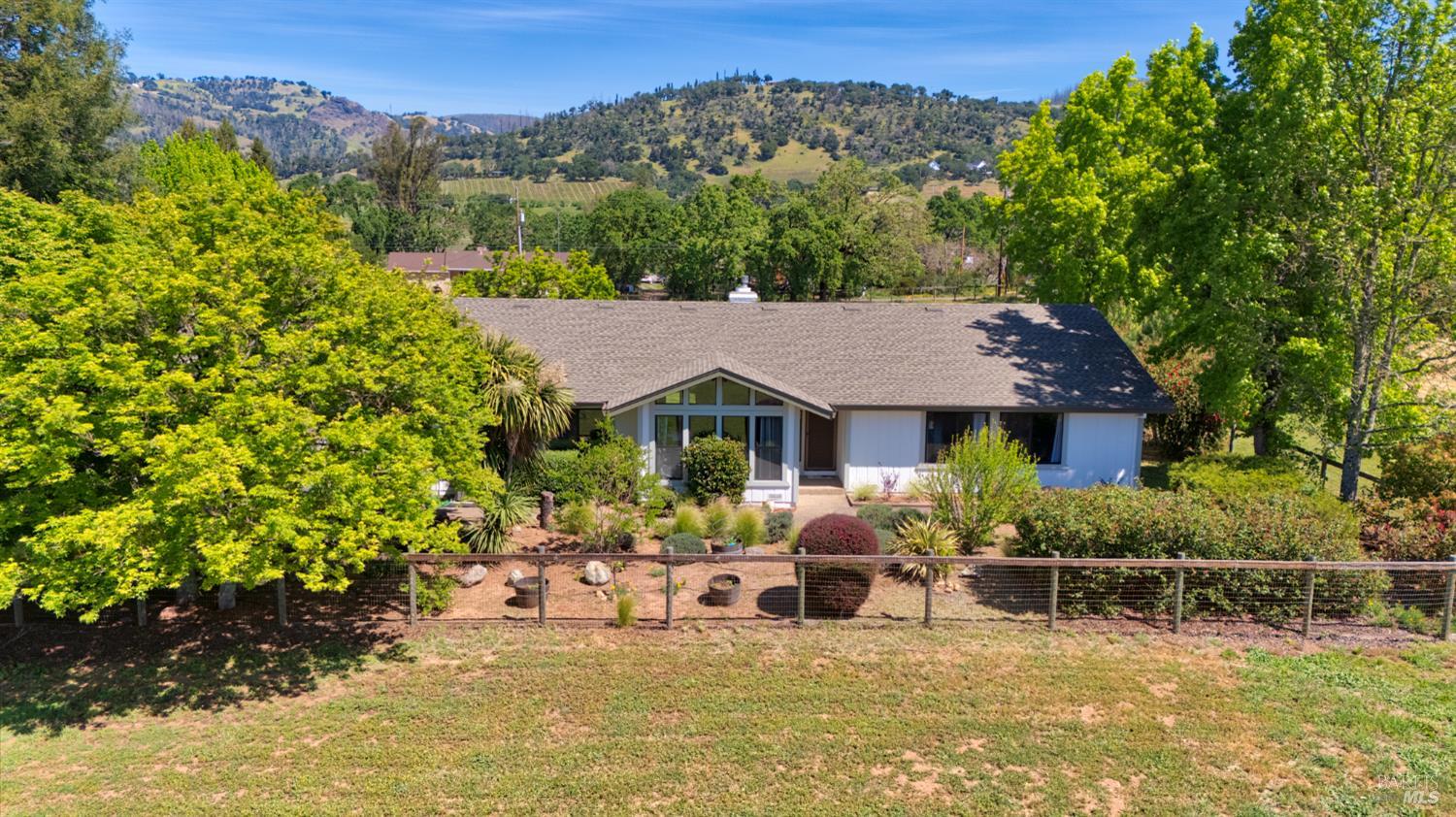 6282 Melita Road Santa Rosa, CA 95409 - Photo 55 of 55 a view of a house with a yard and sitting area