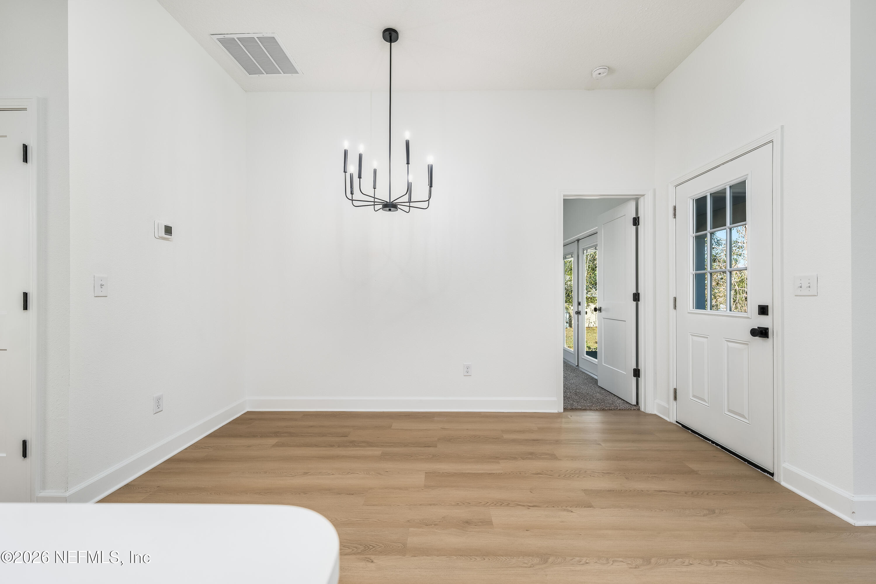 4455 Southeast 3rd Place Keystone Heights, FL 32656 - Photo 20 of 25 a view of empty room with wooden floor