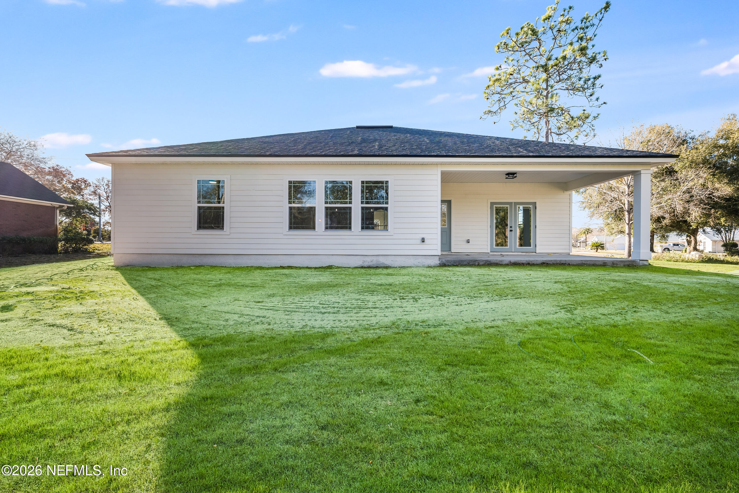 4455 Southeast 3rd Place Keystone Heights, FL 32656 - Photo 23 of 25 a front view of house with yard and green space