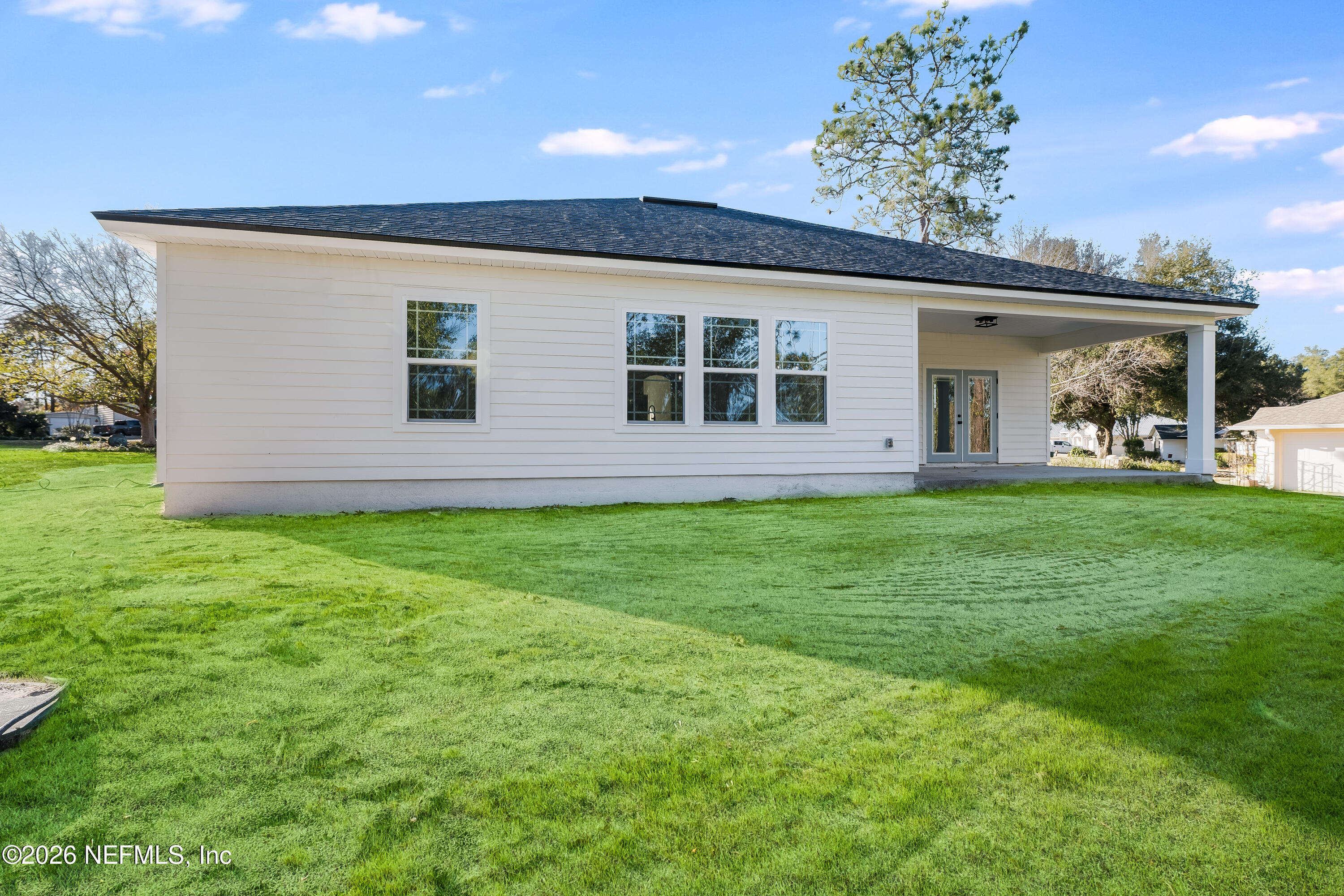 4455 Southeast 3rd Place Keystone Heights, FL 32656 - Photo 24 of 25 a front view of a house with garden
