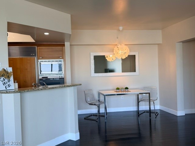 2777 Paradise Road, Unit 807 Las Vegas, NV 89109 - Photo 32 of 61 An open concept design seamlessly blends the kitchen with an adjacent dining area.