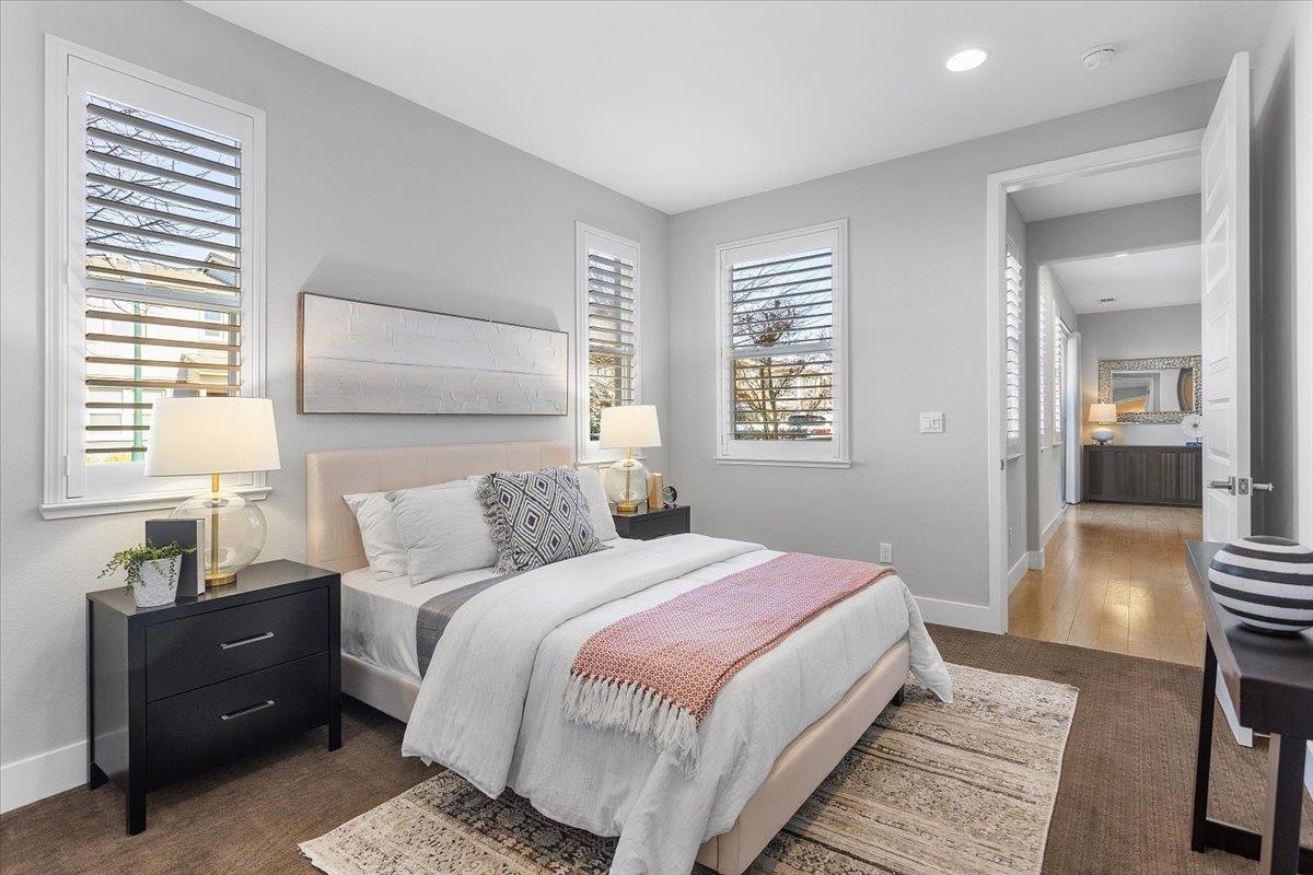 406 Mosley Avenue Alameda, CA 94501 - Photo 21 of 60 a bedroom with a bed and wooden floor