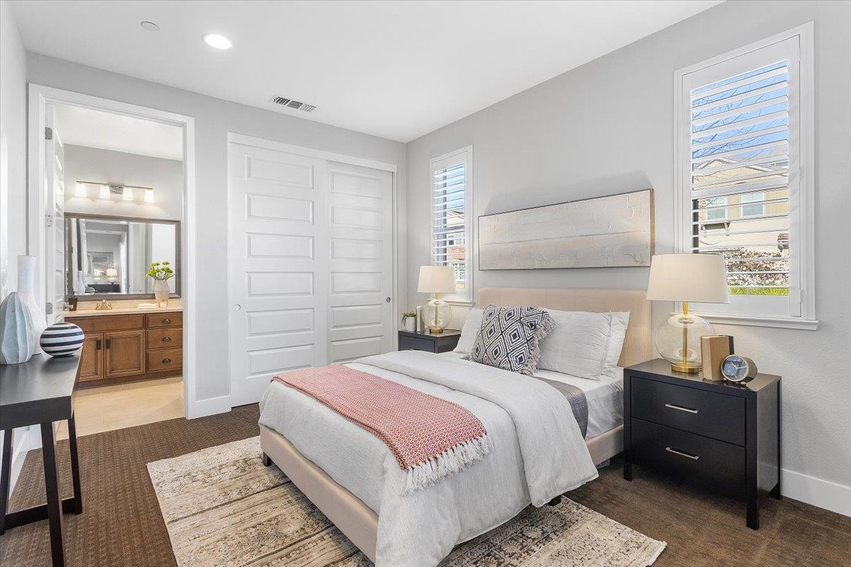 406 Mosley Avenue Alameda, CA 94501 - Photo 22 of 60 a bedroom with a bed and wooden floor