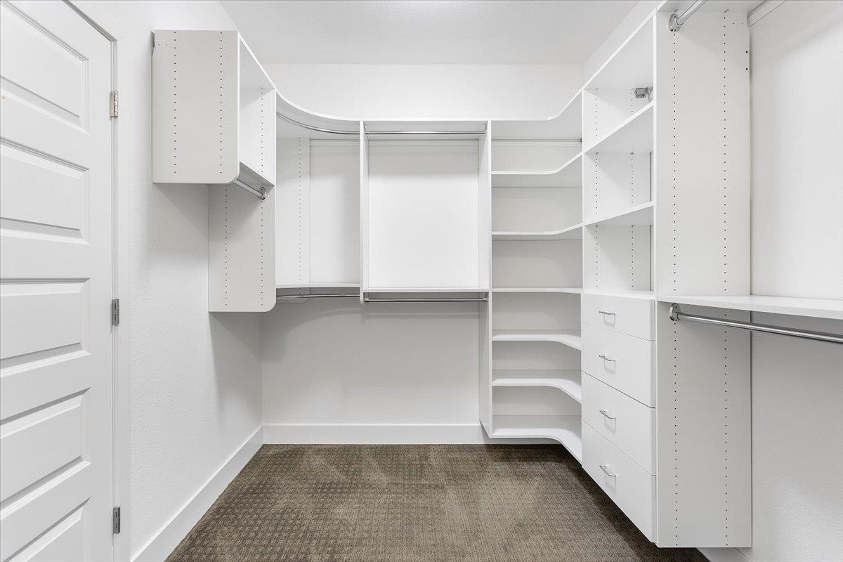 406 Mosley Avenue Alameda, CA 94501 - Photo 37 of 60 a view of walk in closet with empty racks