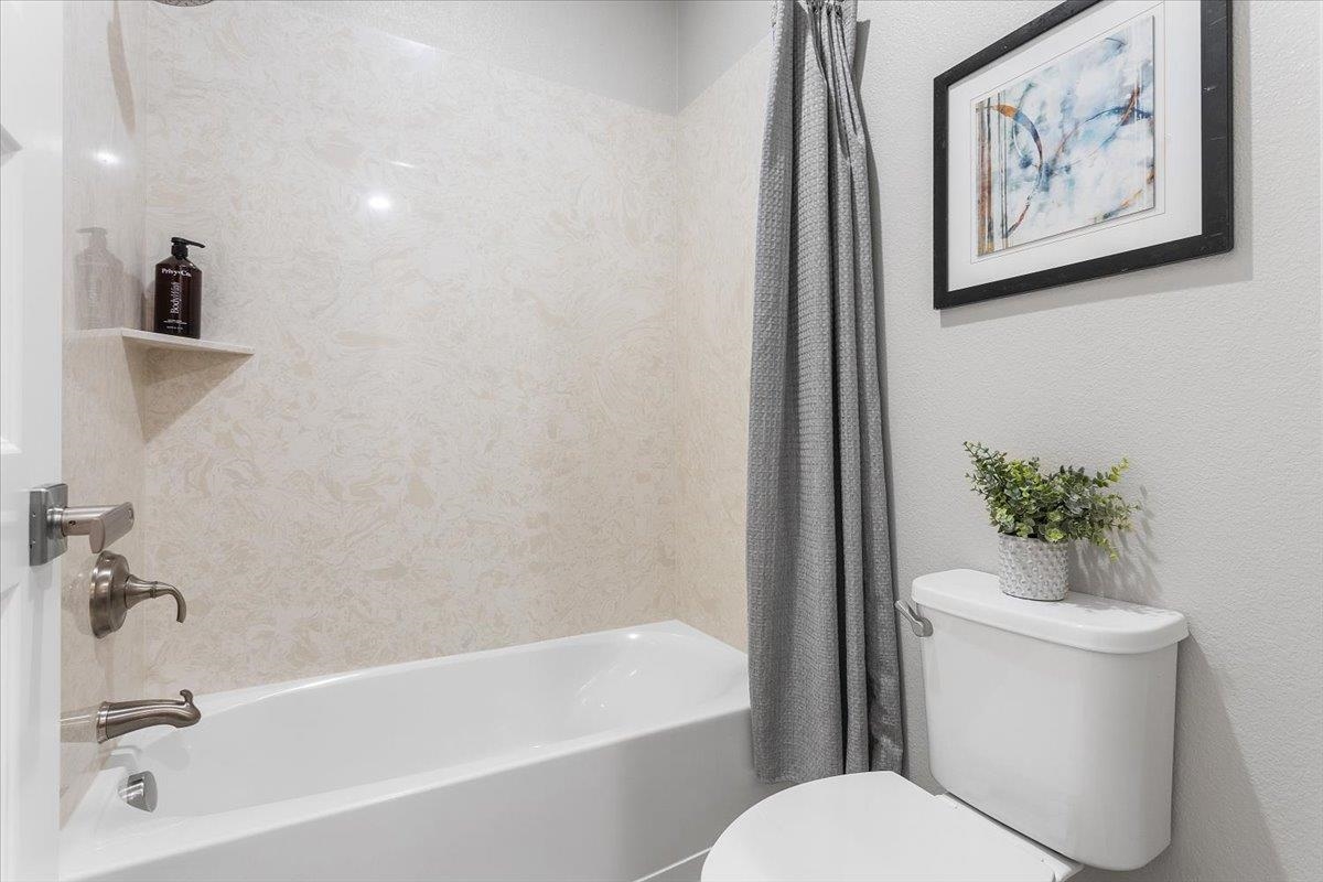 406 Mosley Avenue Alameda, CA 94501 - Photo 44 of 60 a white toilet sitting next to a bath tub