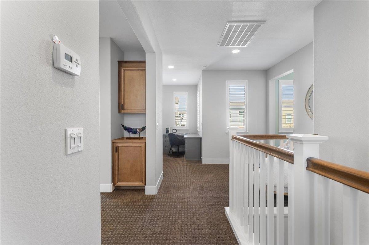 406 Mosley Avenue Alameda, CA 94501 - Photo 48 of 60 a view of a hallway with furniture and stairs