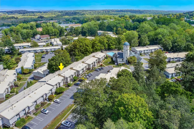 an aerial view of a house with a garden