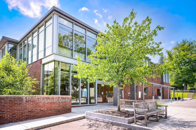 a view of swimming pool from a balcony