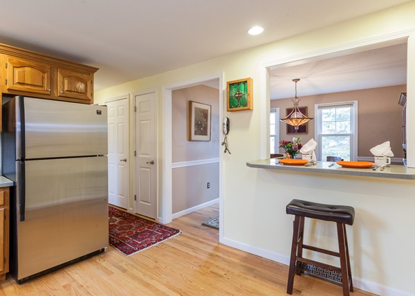 1053 Frank Smith Road Longmeadow, MA 01106 - Photo 17 of 30 a kitchen with stainless steel appliances granite countertop a refrigerator and a stove top oven