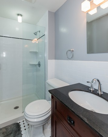 1053 Frank Smith Road Longmeadow, MA 01106 - Photo 27 of 30 a bathroom with a sink a toilet and shower