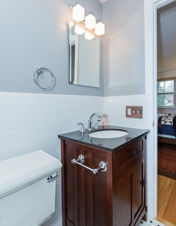 1053 Frank Smith Road Longmeadow, MA 01106 - Photo 28 of 30 a bathroom with a sink and a mirror