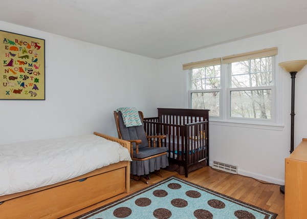 1053 Frank Smith Road Longmeadow, MA 01106 - Photo 29 of 30 a bedroom with a bed and a window