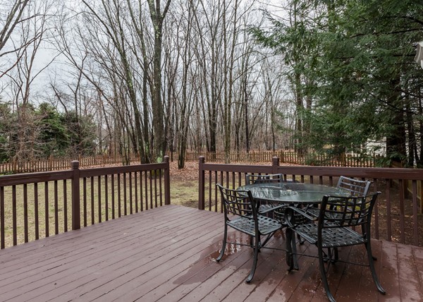 1053 Frank Smith Road Longmeadow, MA 01106 - Photo 7 of 30 a view of balcony with wooden floor and fence