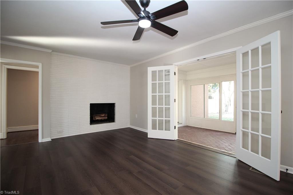 3705 Holts Chapel Road Greensboro, NC 27401 - Photo 17 of 33 French doors lead to enclosed heated and cooled sun room