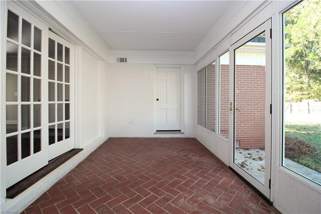 3705 Holts Chapel Road Greensboro, NC 27401 - Photo 19 of 33 Laundry and storage closet behind door in sun room