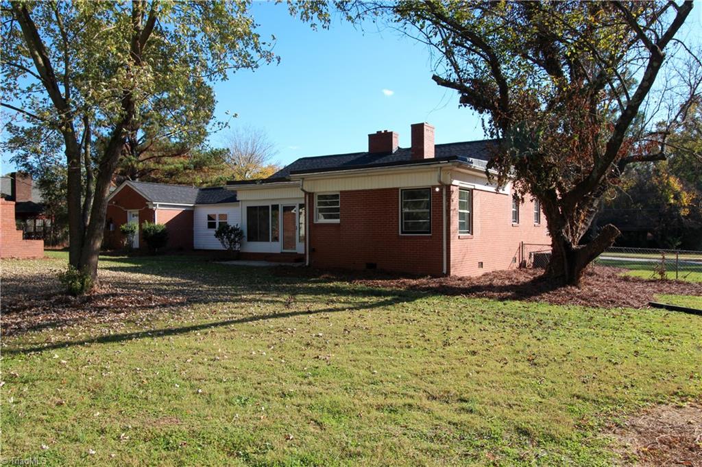 3705 Holts Chapel Road Greensboro, NC 27401 - Photo 31 of 33 Rear of property with flat yard
