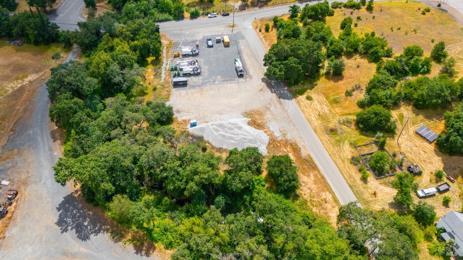 27101 Chrome Iron Road Cloverdale, CA 95425 - Photo 11 of 21 an aerial view of a house with a yard and lake view