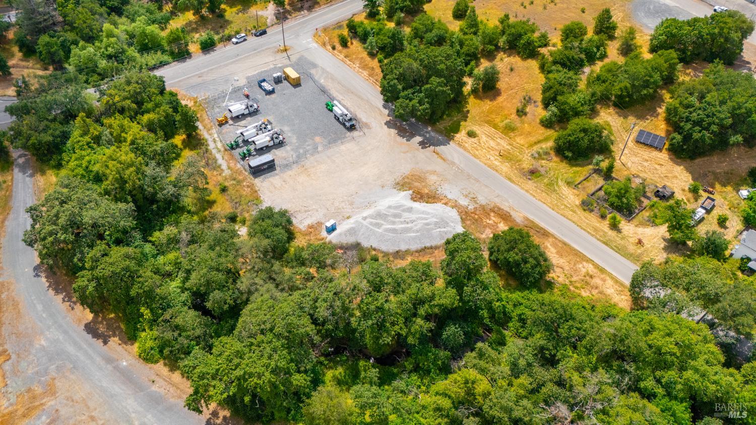 27101 Chrome Iron Road Cloverdale, CA 95425 - Photo 12 of 21 an aerial view of a house with a yard and garden