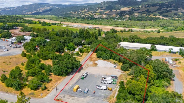 an aerial view of lake residential houses with outdoor space and swimming pool